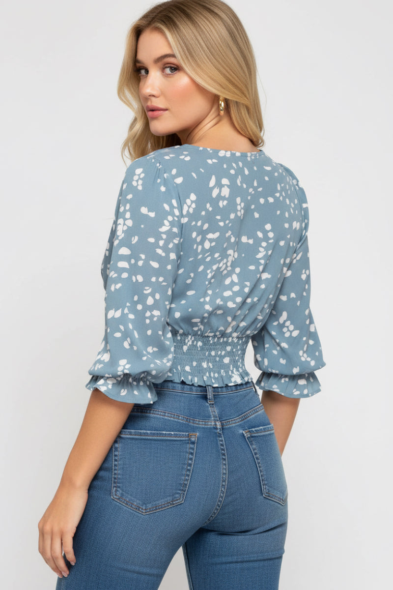 MISTY BLUE PRINTED 3/4 SLEEVES SMOCKED WAISTBAND WOVEN TOP.
