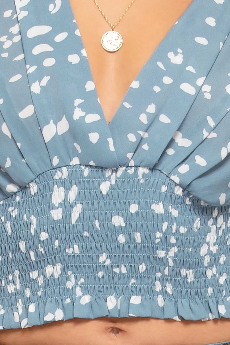 MISTY BLUE PRINTED 3/4 SLEEVES SMOCKED WAISTBAND WOVEN TOP.