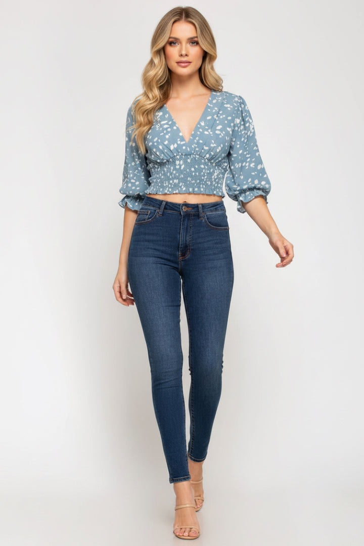 MISTY BLUE PRINTED 3/4 SLEEVES SMOCKED WAISTBAND WOVEN TOP.