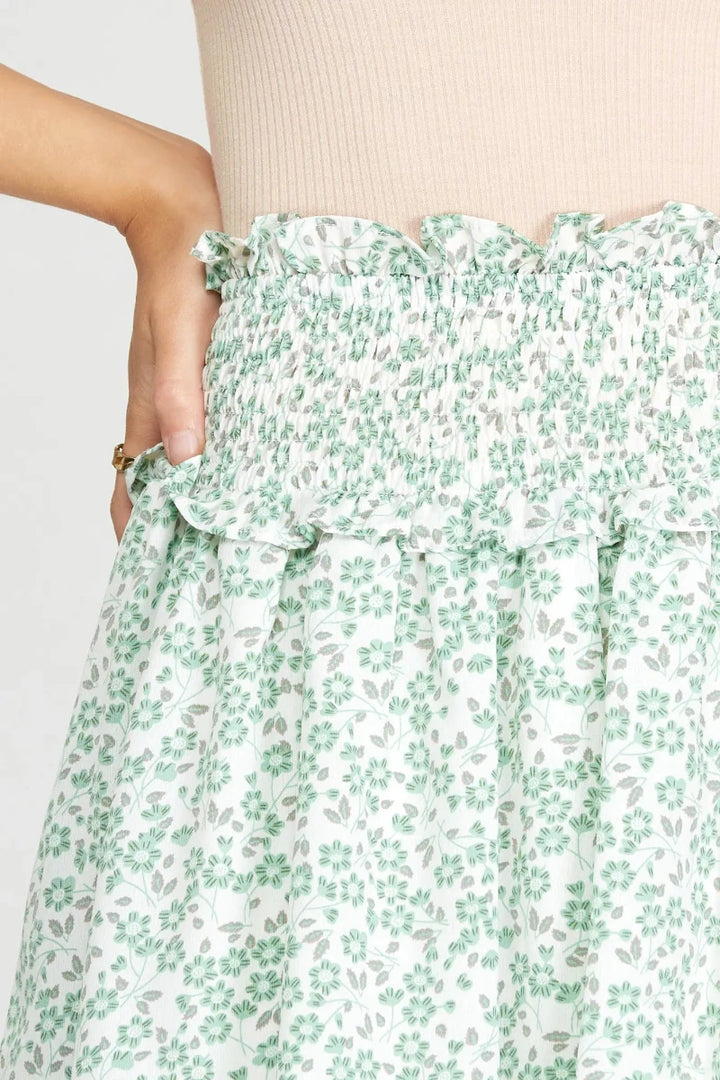 YELLOW FLORAL PRINT SMOCKED WOVEN MINI SKIRT