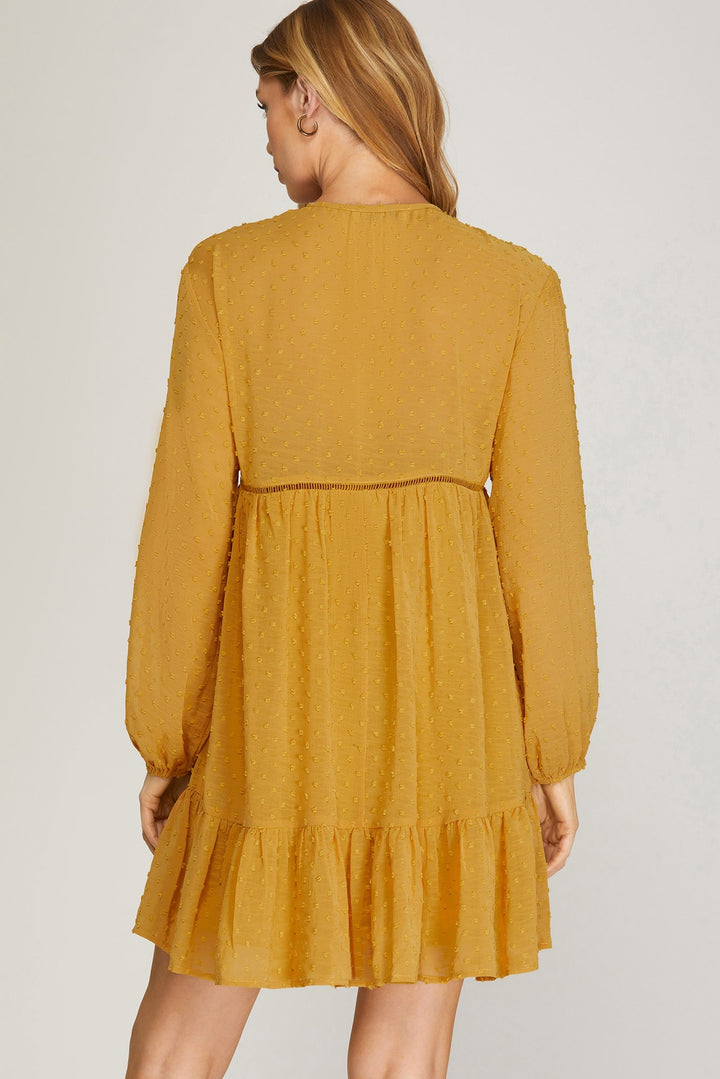 LONG SLEEVE SWISS DOT DRESS WITH SMOCKED DETAIL AND FRONT NECK TIE