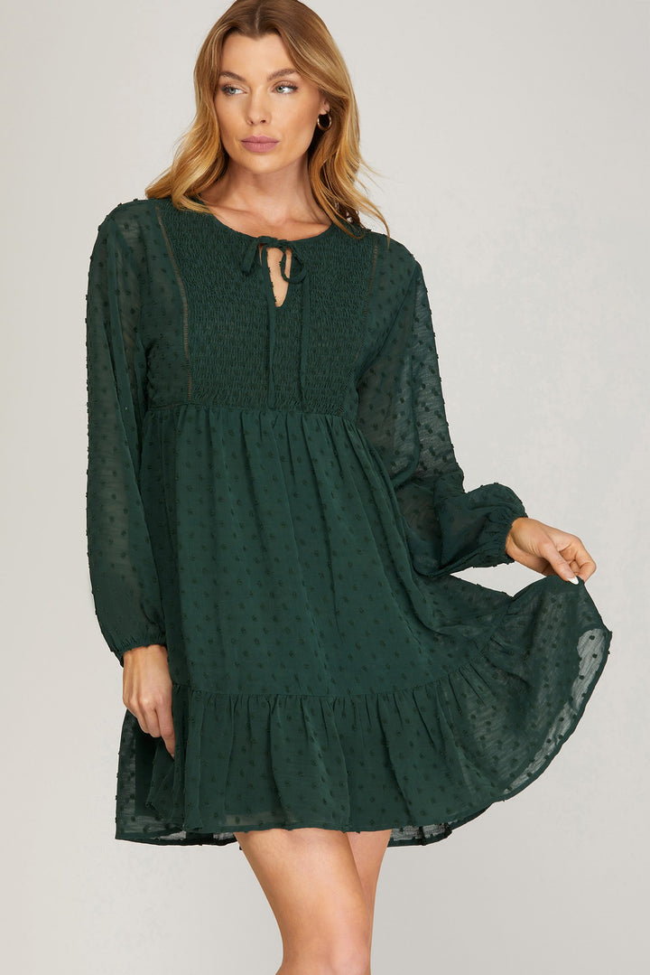 LONG SLEEVE SWISS DOT DRESS WITH SMOCKED DETAIL AND FRONT NECK TIE