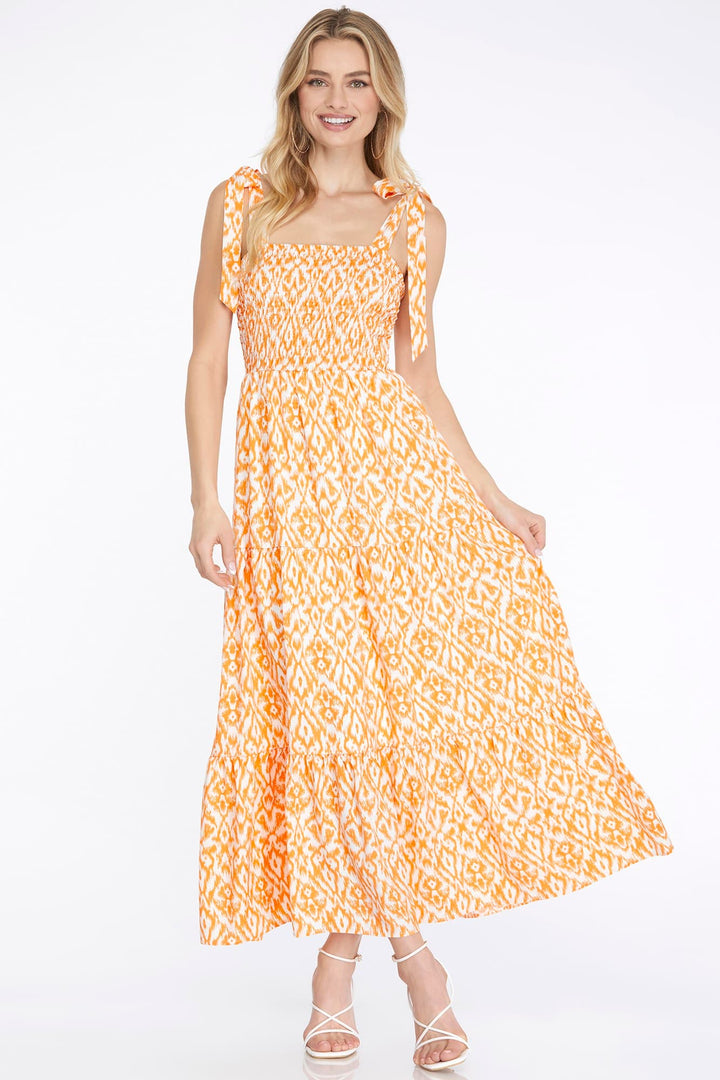 SMOCKED TIERED PRINT MAXI DRESS WITH SIDE POCKETS