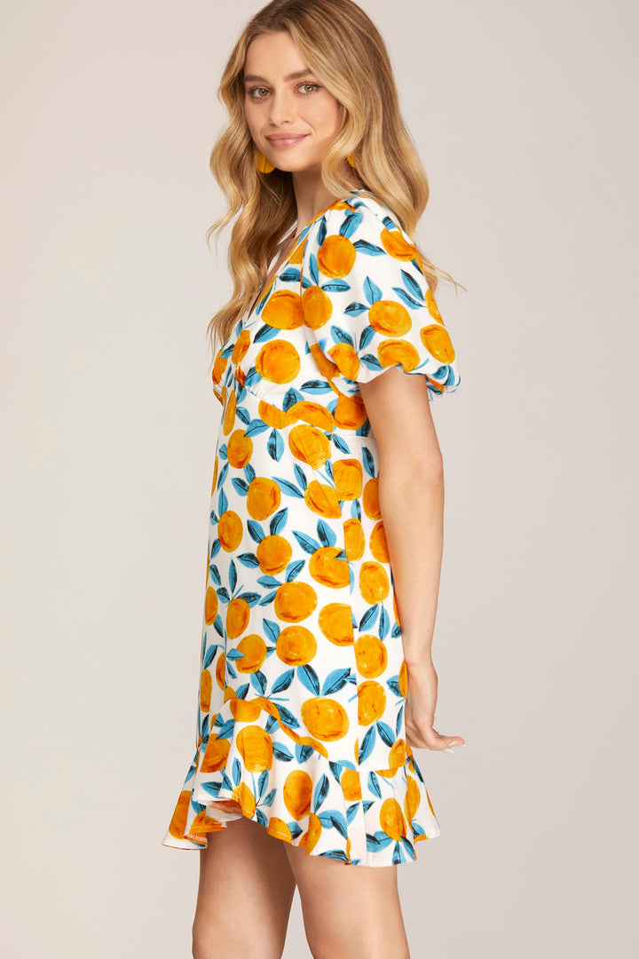PUFF SHORT SLEEVE WOVEN CITRUS PRINT RUFFLE HEM V NECK DRESS