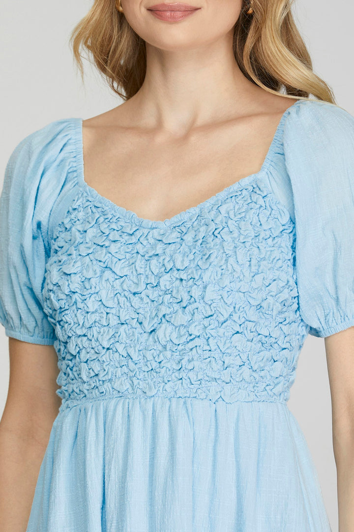 SHORT SLEEVE WOVEN DRESS WITH TEXTURED DETAIL-SKSY6884