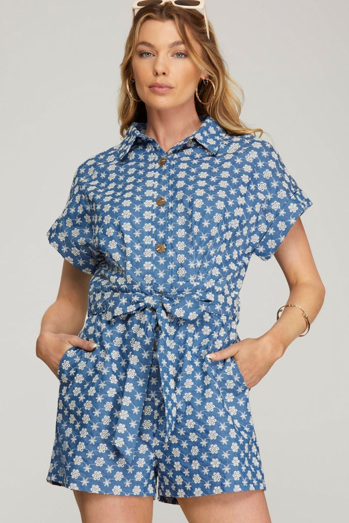 DENIM BLUE COLLARED BUTTON DOWN W/ POCKETS EYELET ROMPER SKSY7019