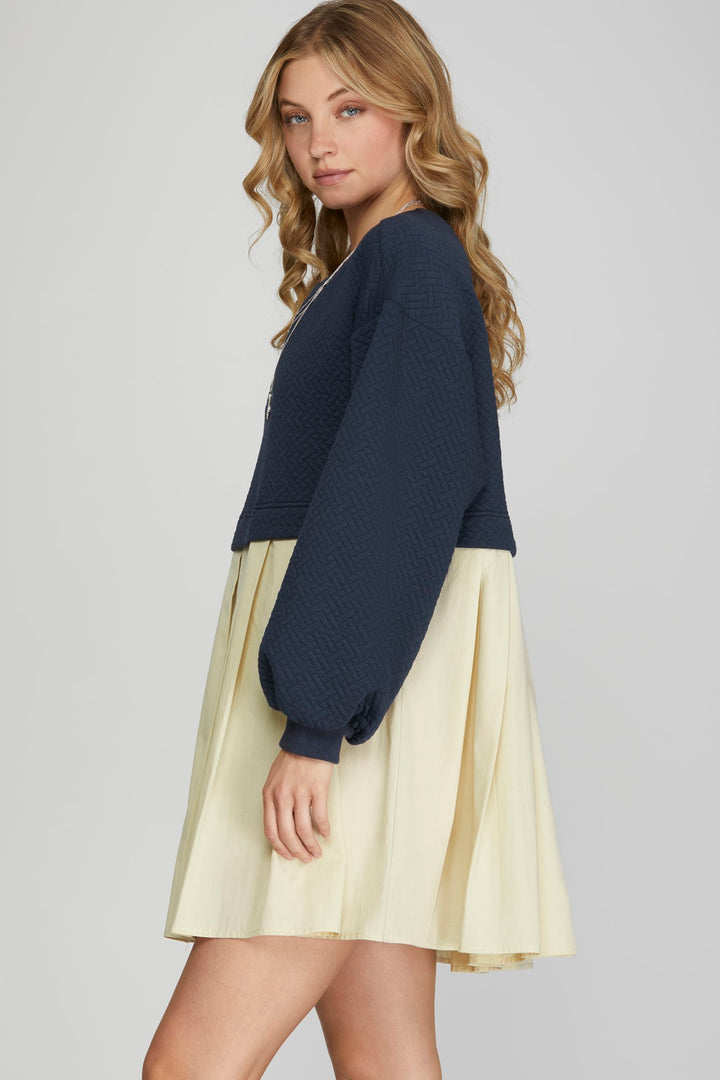 KNIT PLEATED DRESS WITH CONTRAST COLOR BLOCK