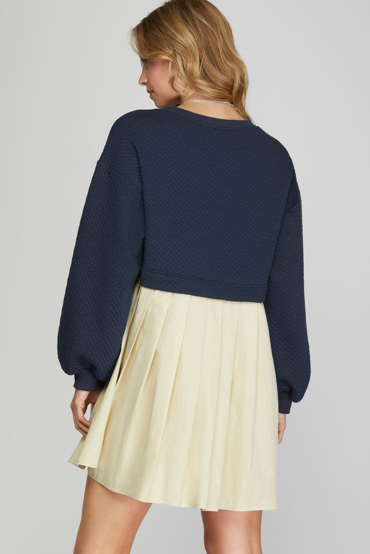 KNIT PLEATED DRESS WITH CONTRAST COLOR BLOCK