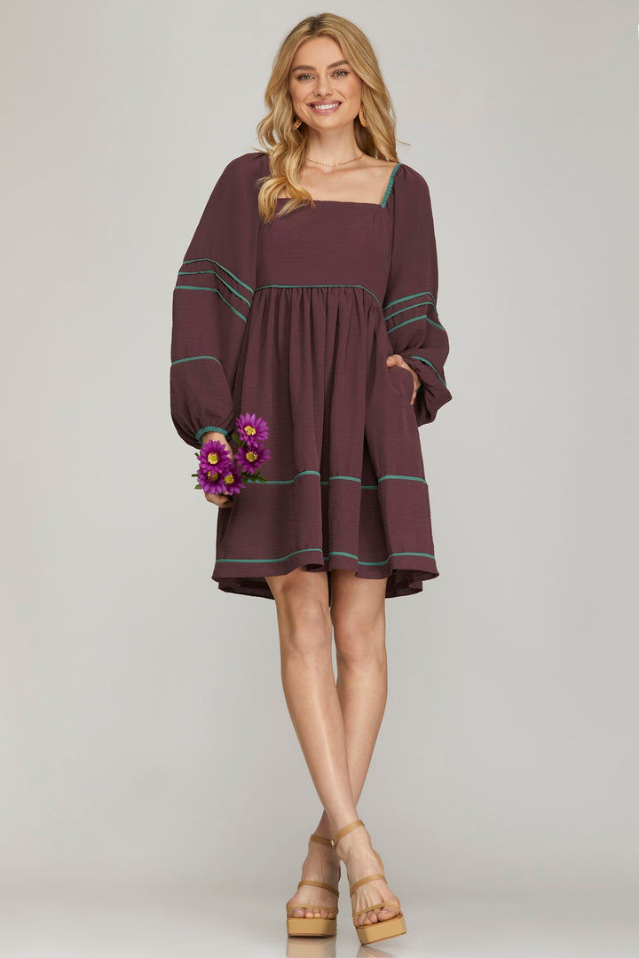 LONG SLEEVE WOVEN DRESS WITH CONTRAST BINDING DETAIL WITH SIDE POCKETS