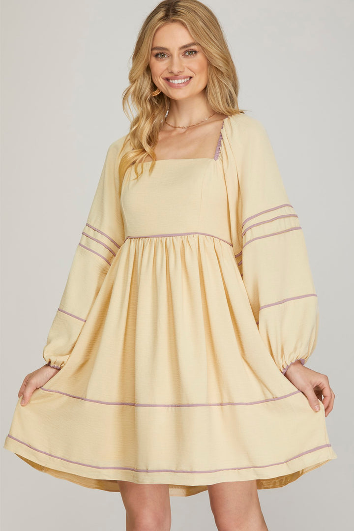 LONG SLEEVE WOVEN DRESS WITH CONTRAST BINDING DETAIL WITH SIDE POCKETS