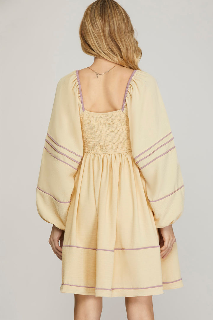 LONG SLEEVE WOVEN DRESS WITH CONTRAST BINDING DETAIL WITH SIDE POCKETS