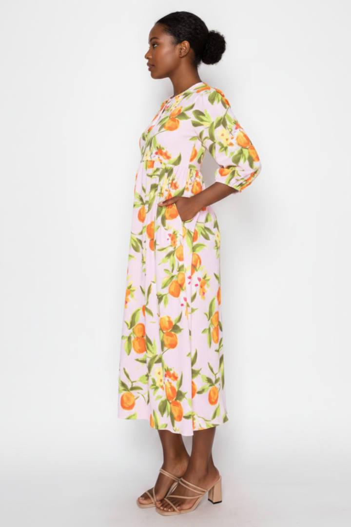 PLUS SIZE FLOWY MIDI DRESS FEATURING A ROUND NECKLINE*