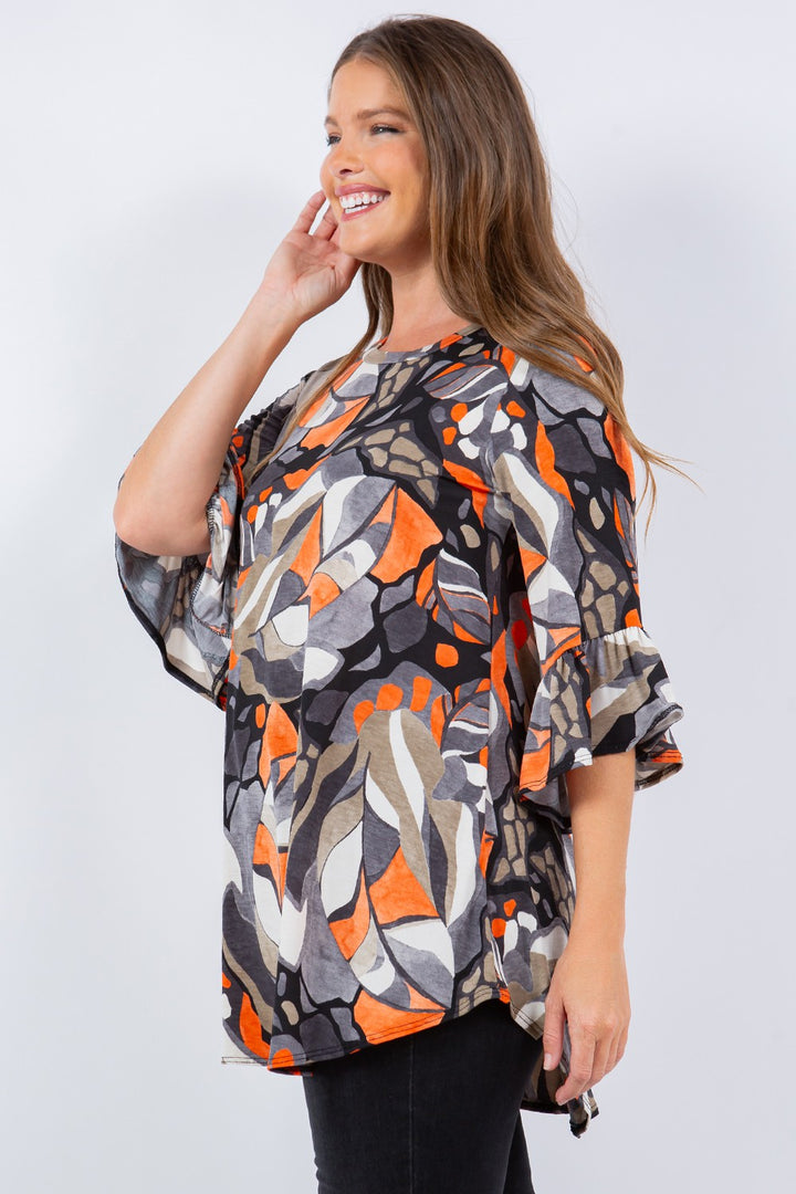 ORANGE ABSTRACT PRINT TUNIC TOP DETAIL ON THE SLEEVES