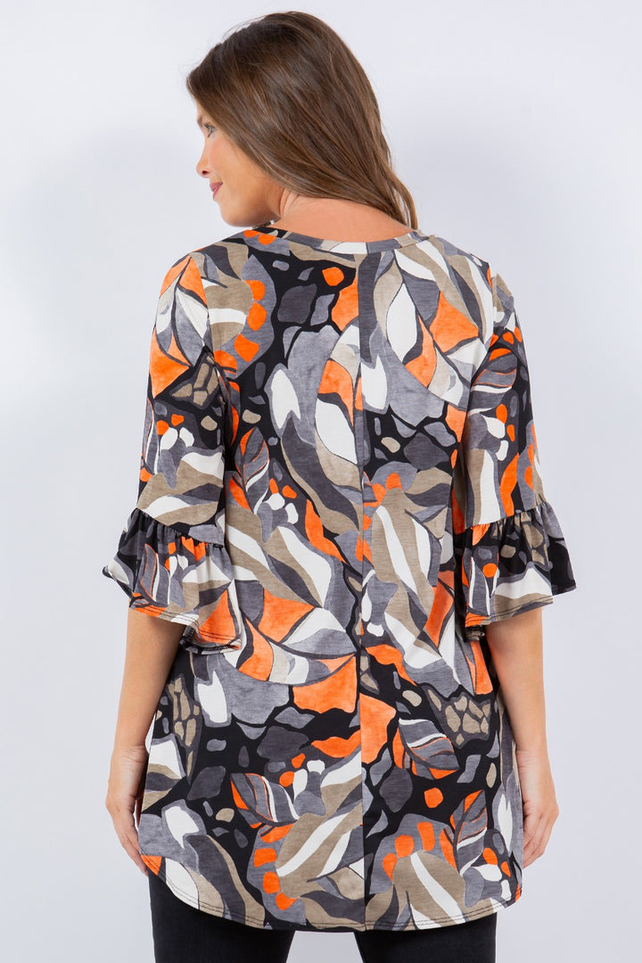 ORANGE ABSTRACT PRINT TUNIC TOP DETAIL ON THE SLEEVES