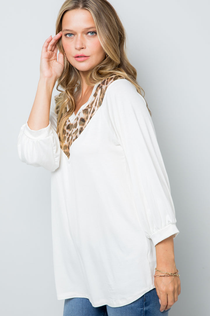 IVORY GOLD SOLID V-NECK TOP WITH LEOPARD CONTRAST DETAIL