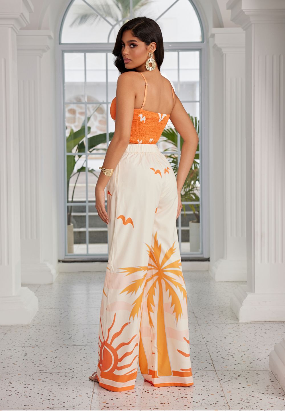 BIRD SLEEVELESS CROP TOP AND WIDE FLARE LONG PANTS SET. CWCS53060
