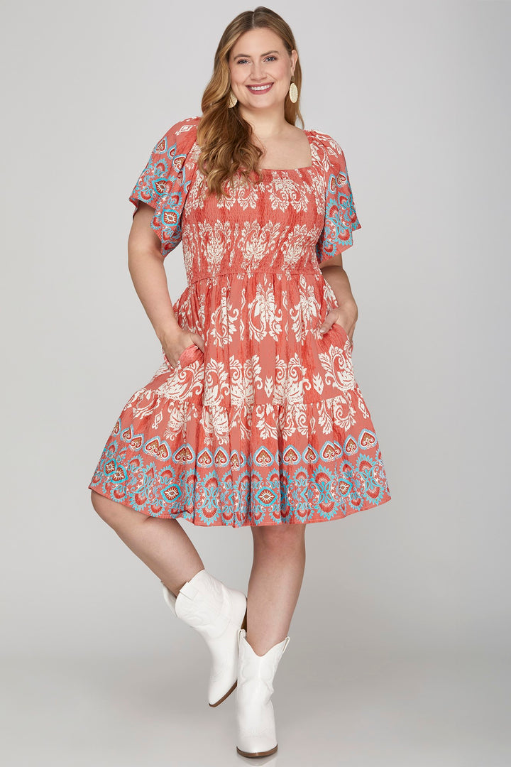 SKPSY8665-PL-Wholesale Red SMOCKED BORDER PRINT WOVEN MINI DRESS