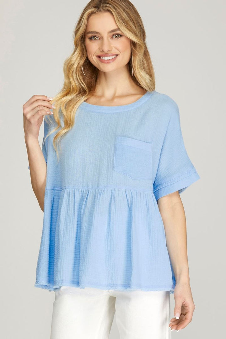 LT. BLUE SHORT SLEEVES FRONT PATCH POCKET BABYDOLL WOVEN TOP
