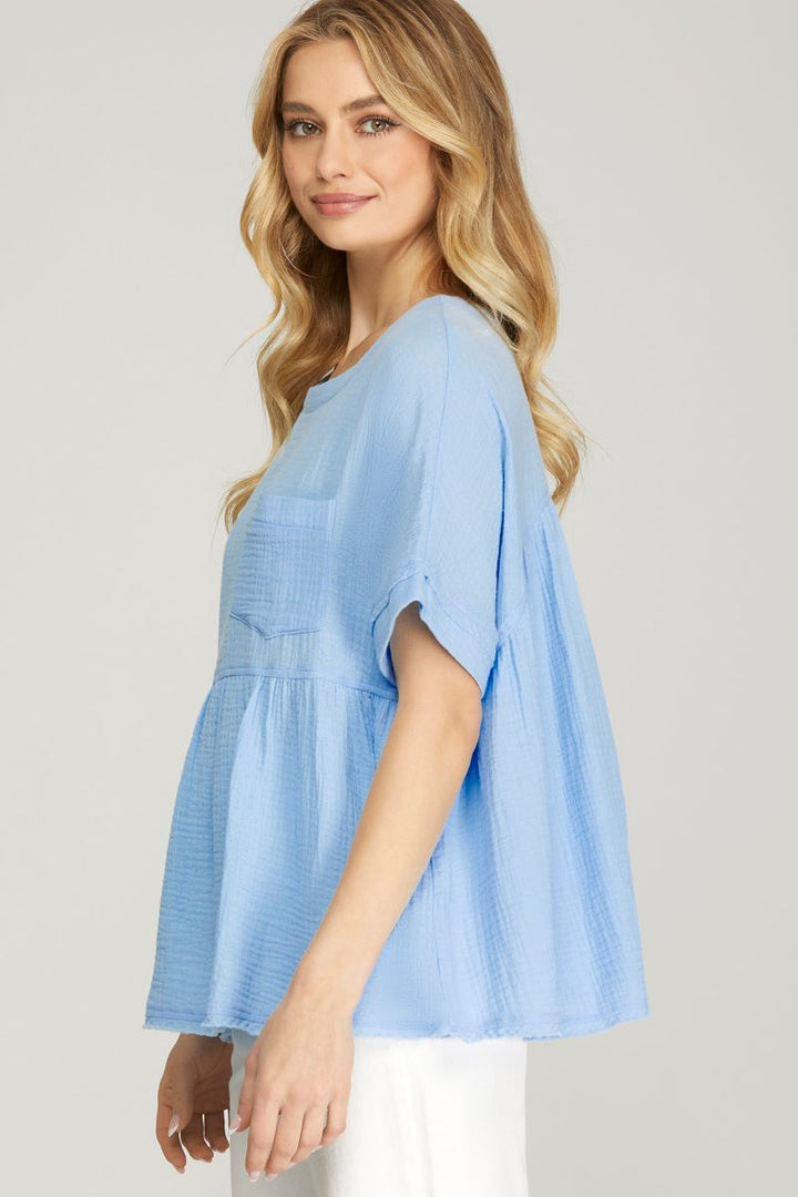 LT. BLUE SHORT SLEEVES FRONT PATCH POCKET BABYDOLL WOVEN TOP