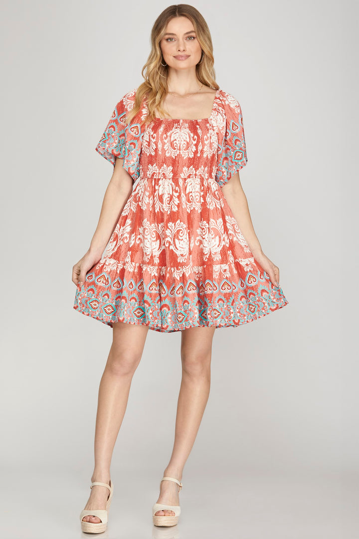 SKSY8665-Wholesale Red SMOCKED BORDER PRINT WOVEN MINI DRESS