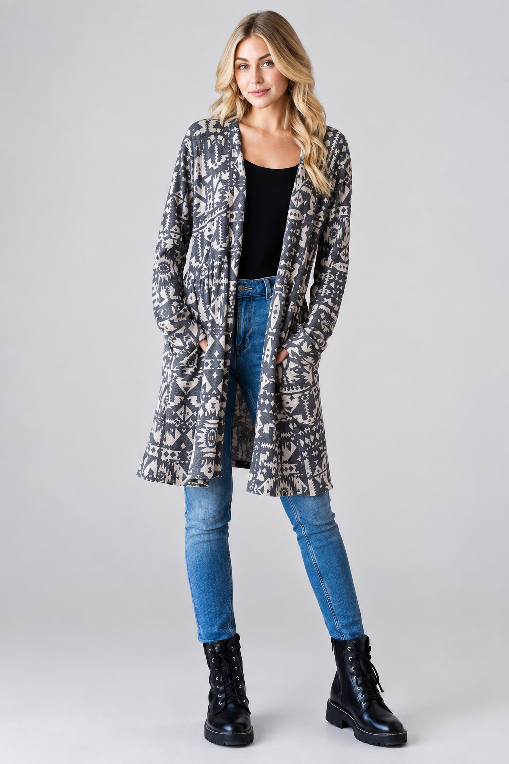 Aztec print cardigan with pockets, blonde model, studio background
