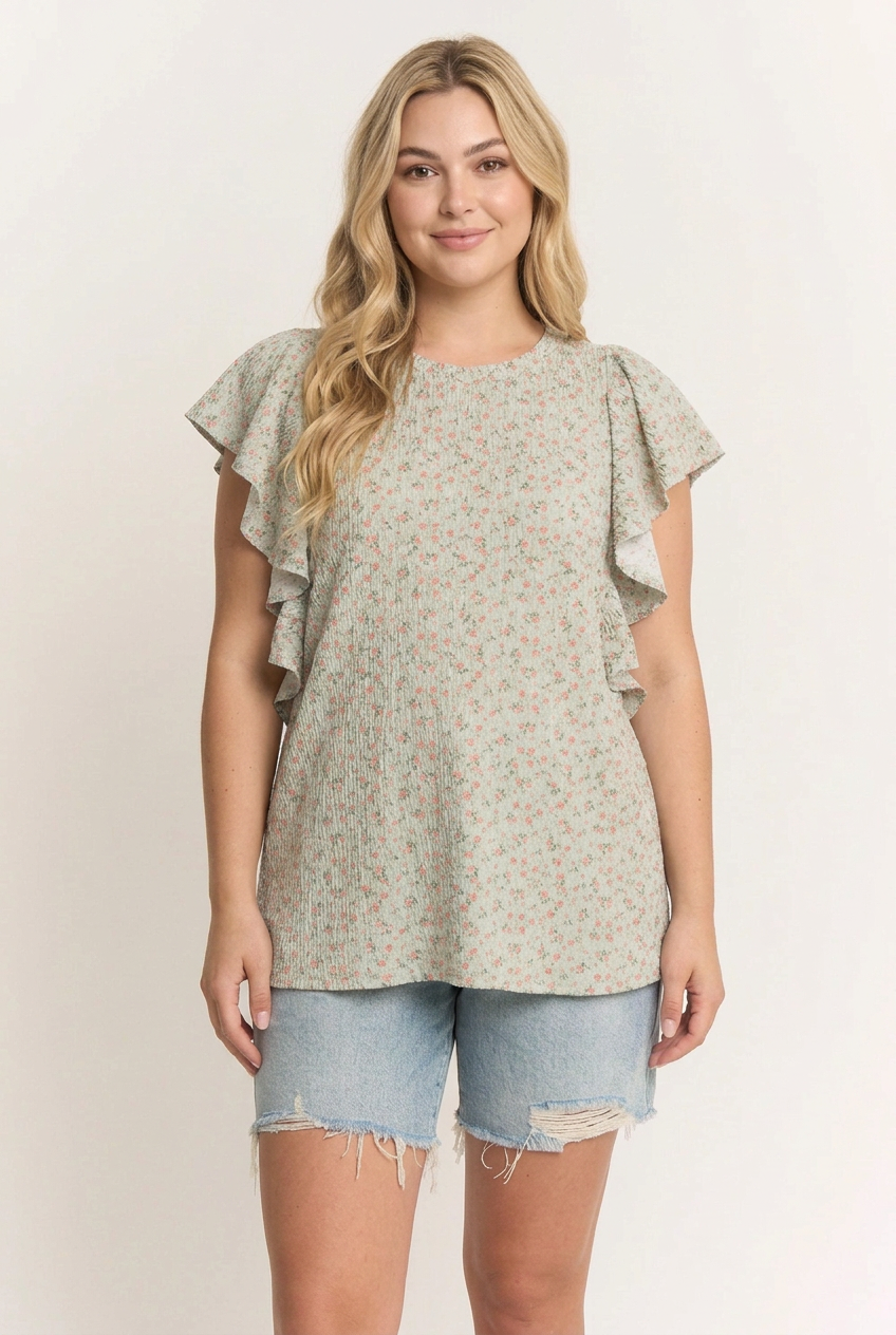 Blonde model with a new face wearing the floral ruffle top