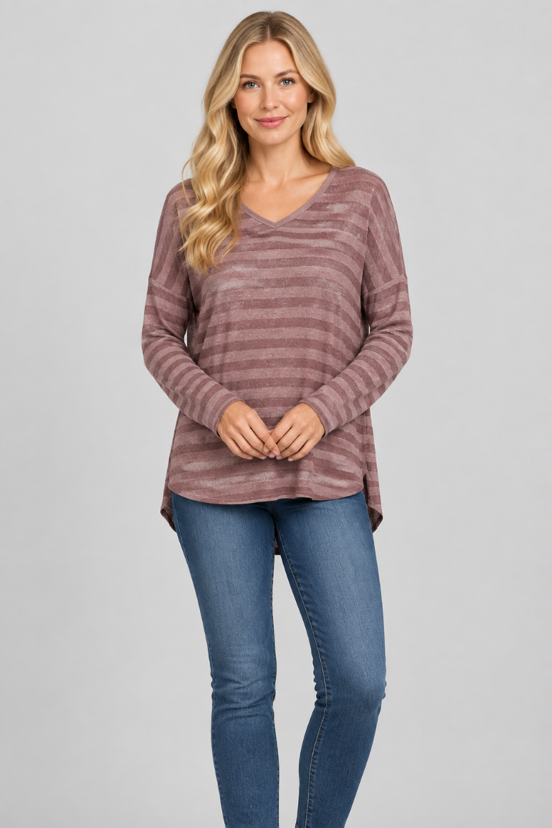 Corrected studio front view of the mauve striped top on a new blonde model, without a hat