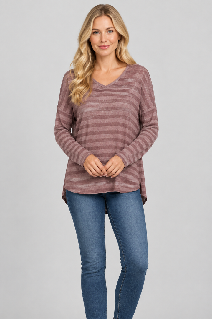 Corrected studio front view of the mauve striped top on a new blonde model, without a hat