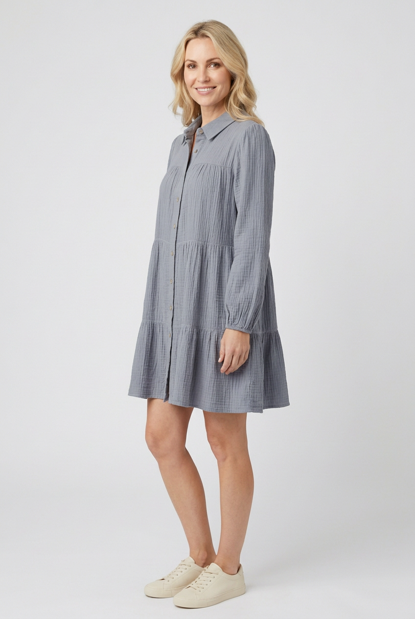 Dusty-blue tiered dress side studio view