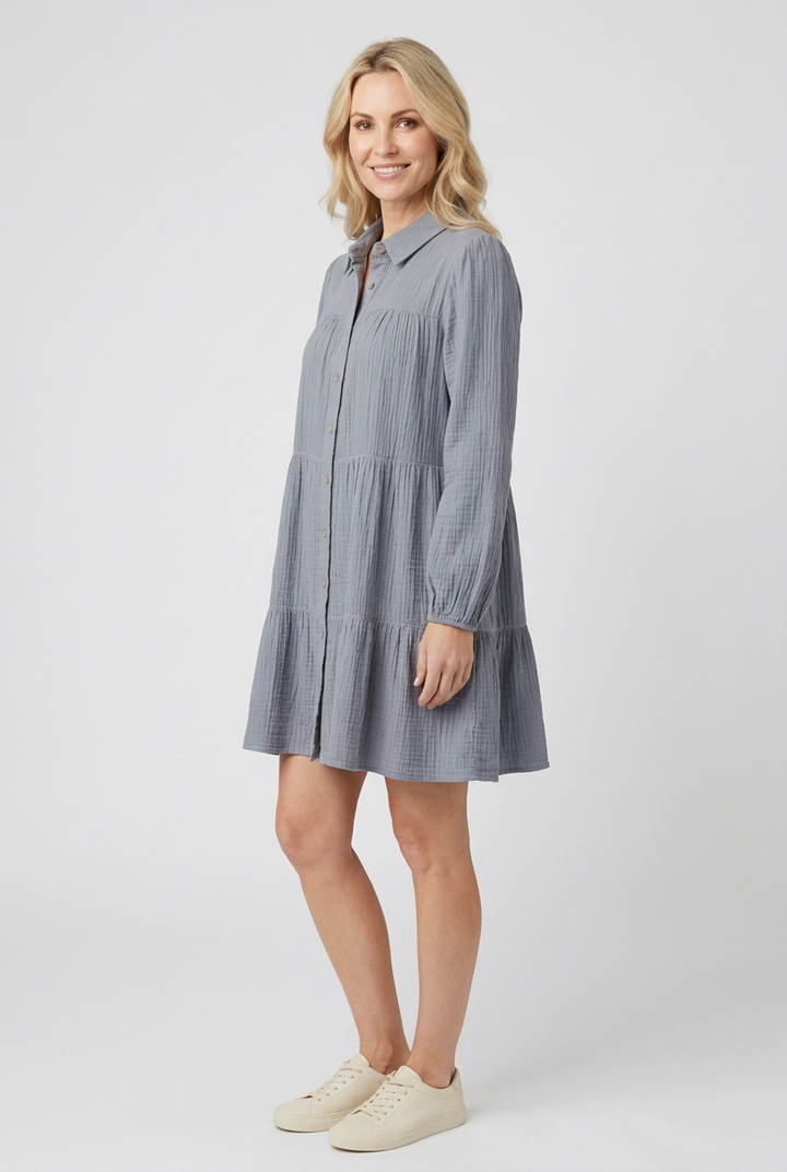 Dusty-blue tiered dress side studio view