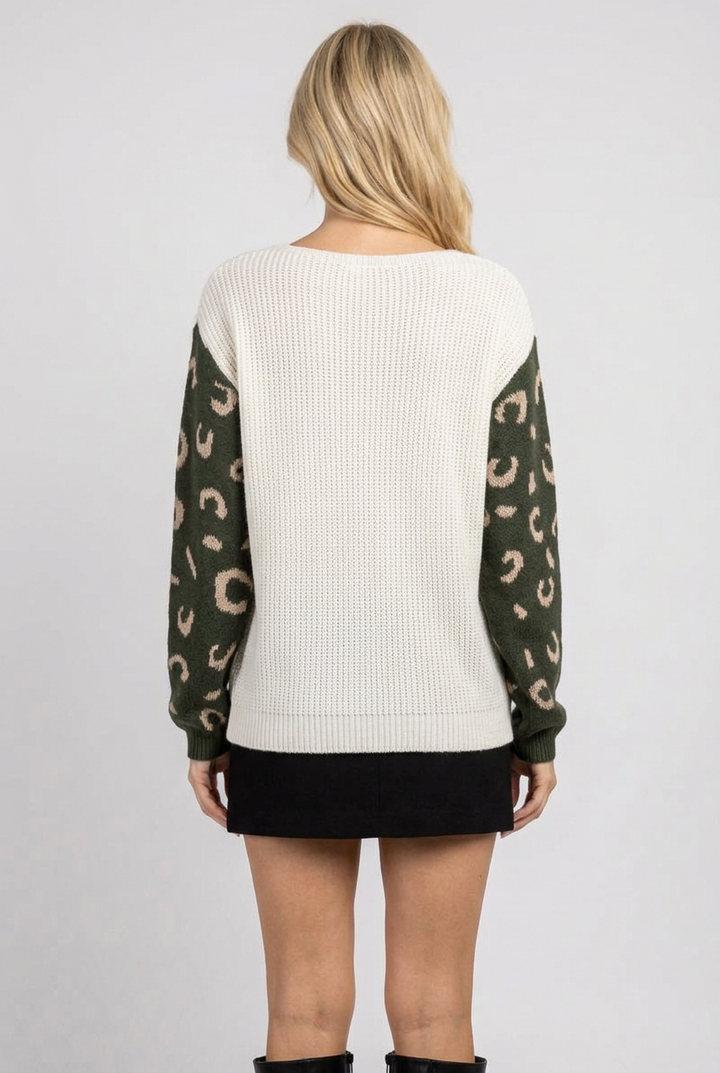 Full-back studio view of the ivory sweater with olive patterned sleeves