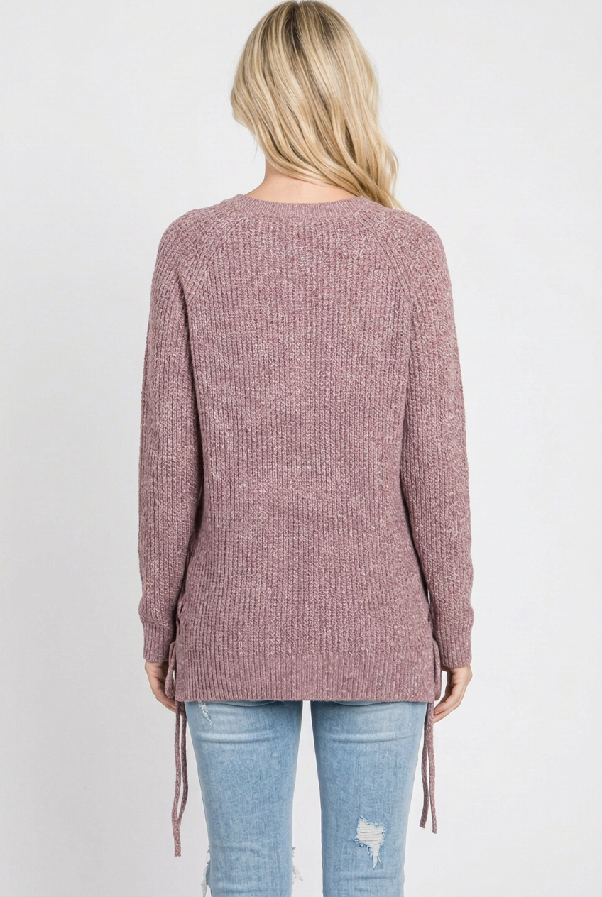 Full-back studio view of the mauve knit sweater without a beanie