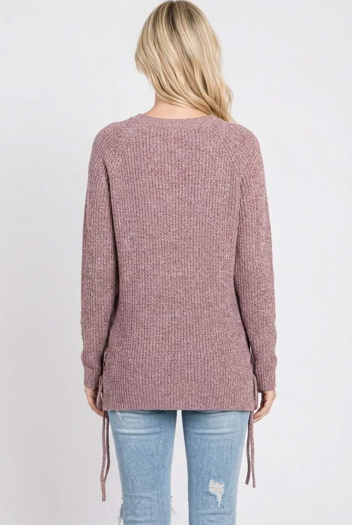 Full-back studio view of the mauve knit sweater without a beanie