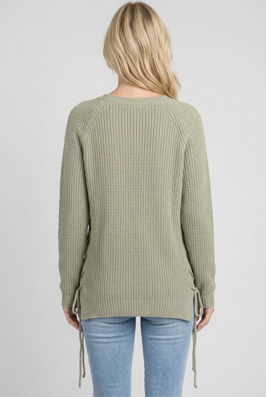 Full-back studio view of the sage knit sweater without a beanie