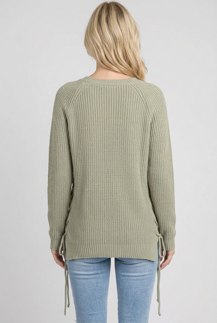 Full-back studio view of the sage knit sweater without a beanie