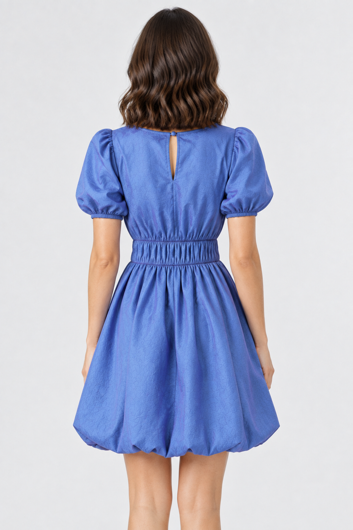 Full back view, blue puff-sleeve dress, studio background