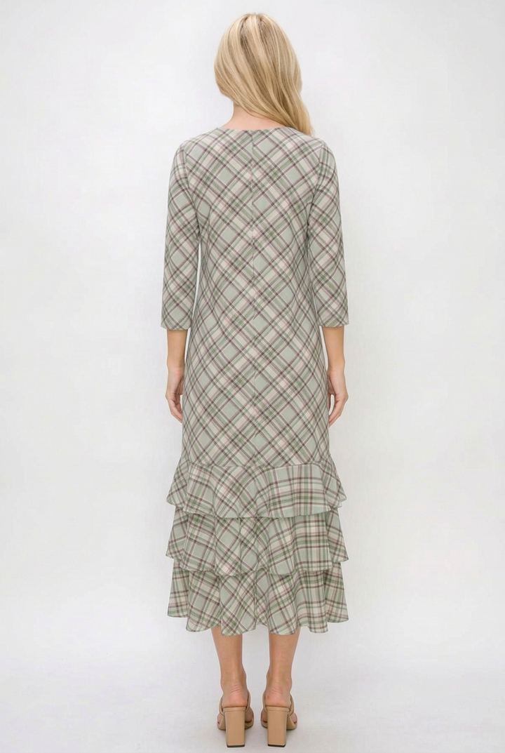 Full back view of the regular-size blonde model wearing the plaid dress