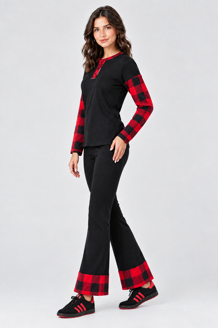 Full-body studio side view, black outfit with red plaid accents, coordinating black-and-red sneakers