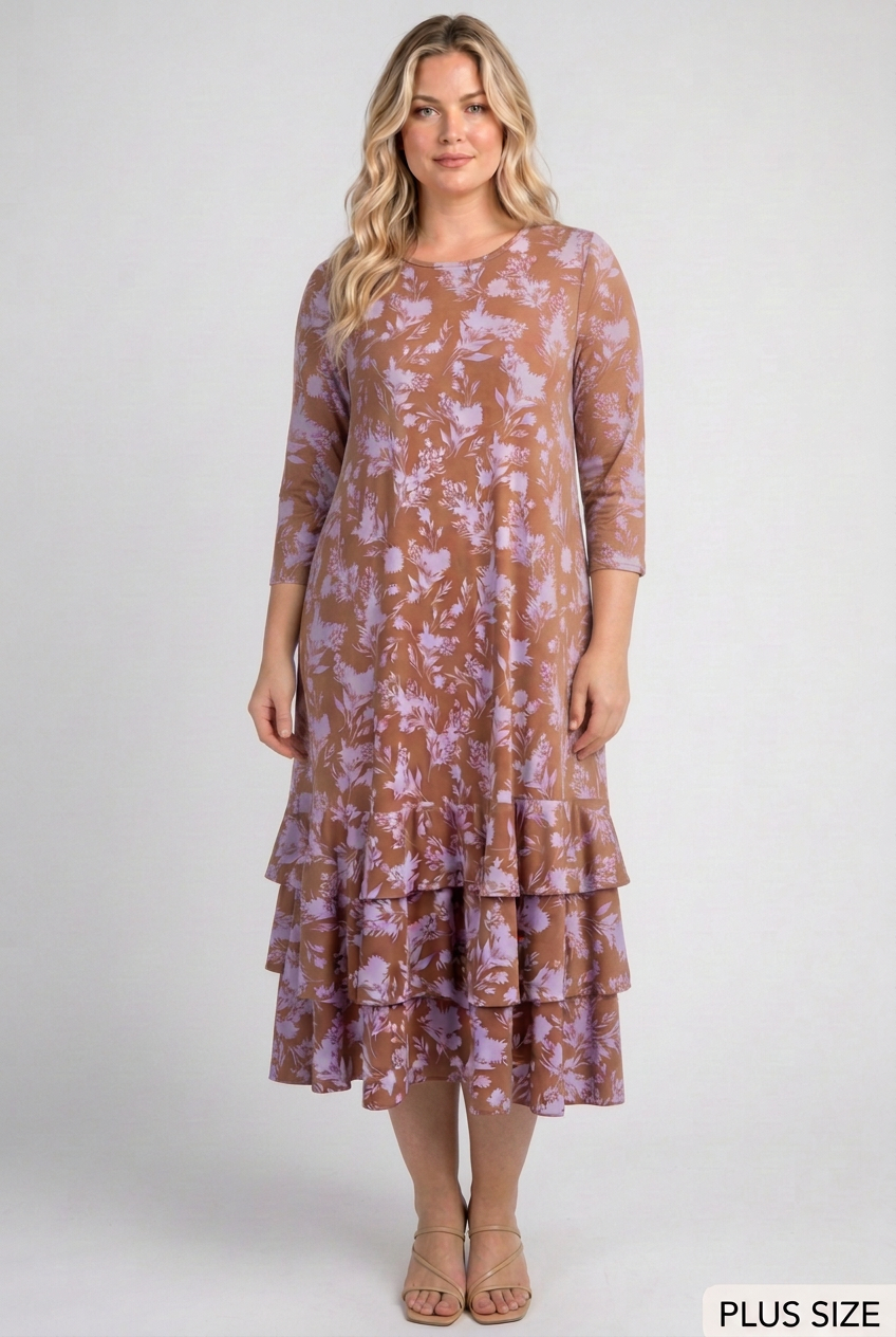 Fuller curvy blonde model wearing the floral dress