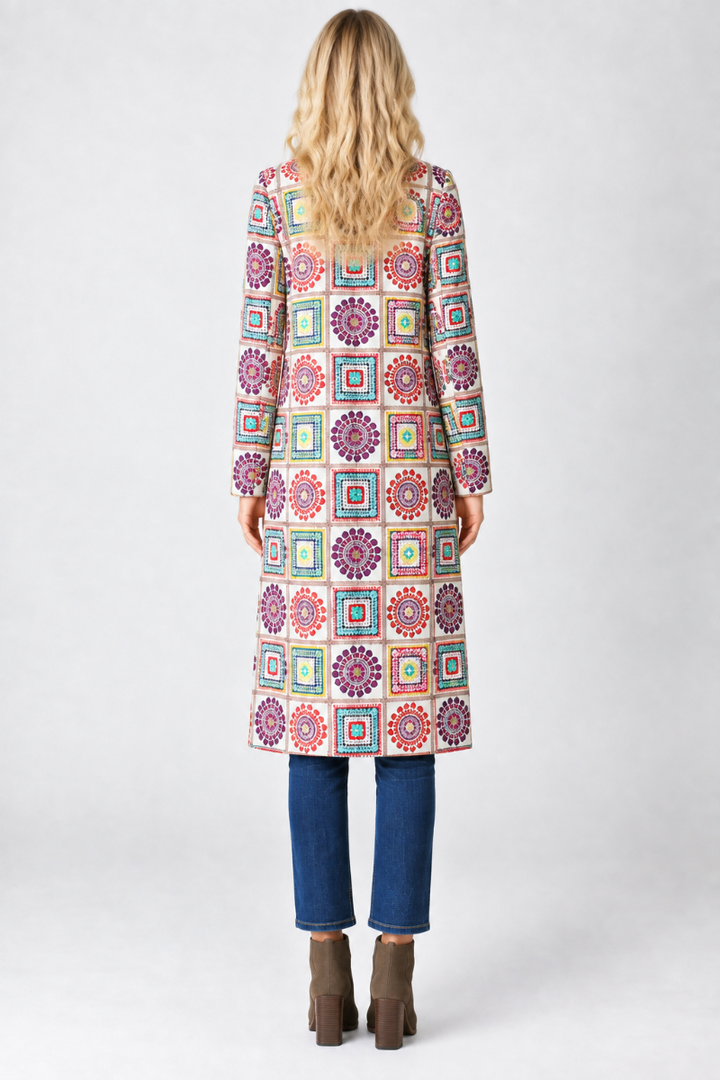 Geometric print cardigan, blonde model, full back pose, studio background