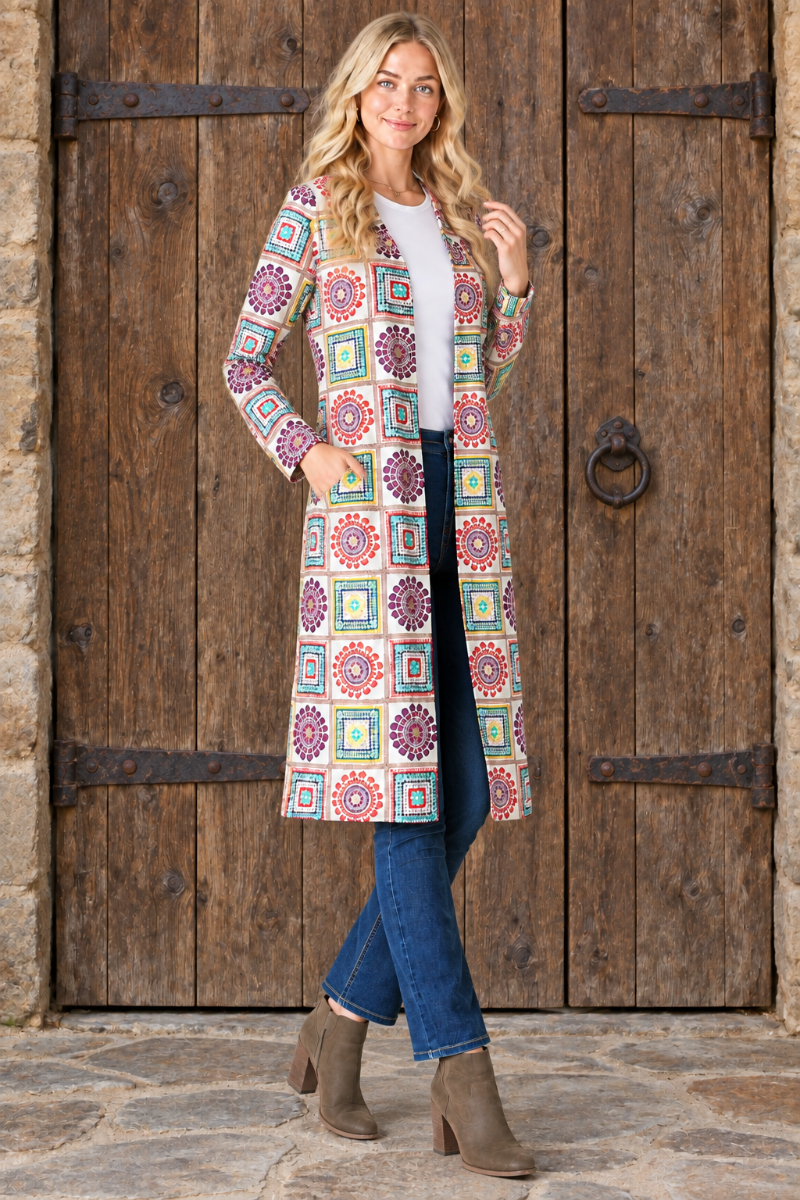 Geometric print cardigan, blonde model, new pose, rustic door background