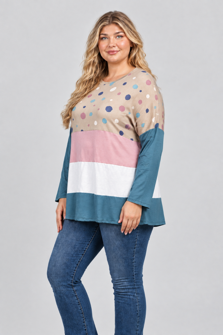 Hat-free studio side view of blonde model in taupe dotted color-block top and blue jeans