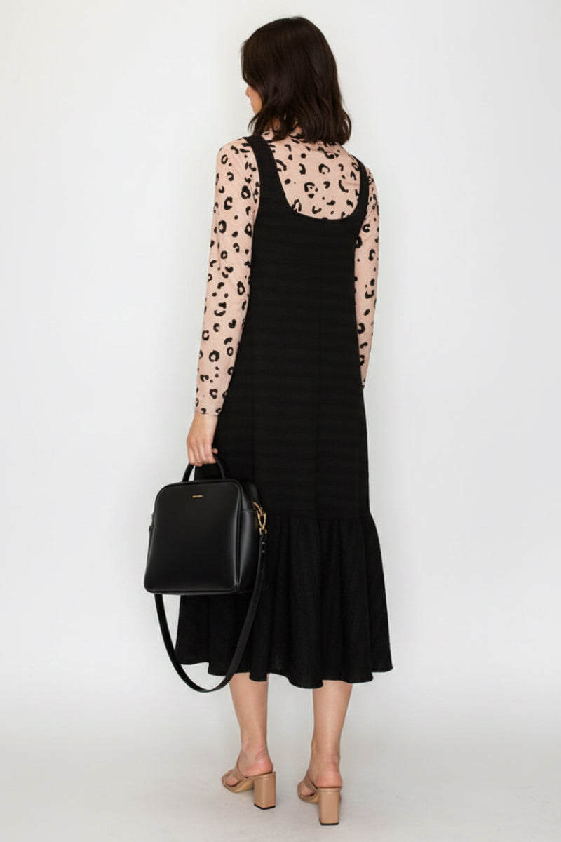 PLUS SIZE EFFORTLESS STYLE MEETS COMFORT IN THIS RELAXED JUMPER DRESS