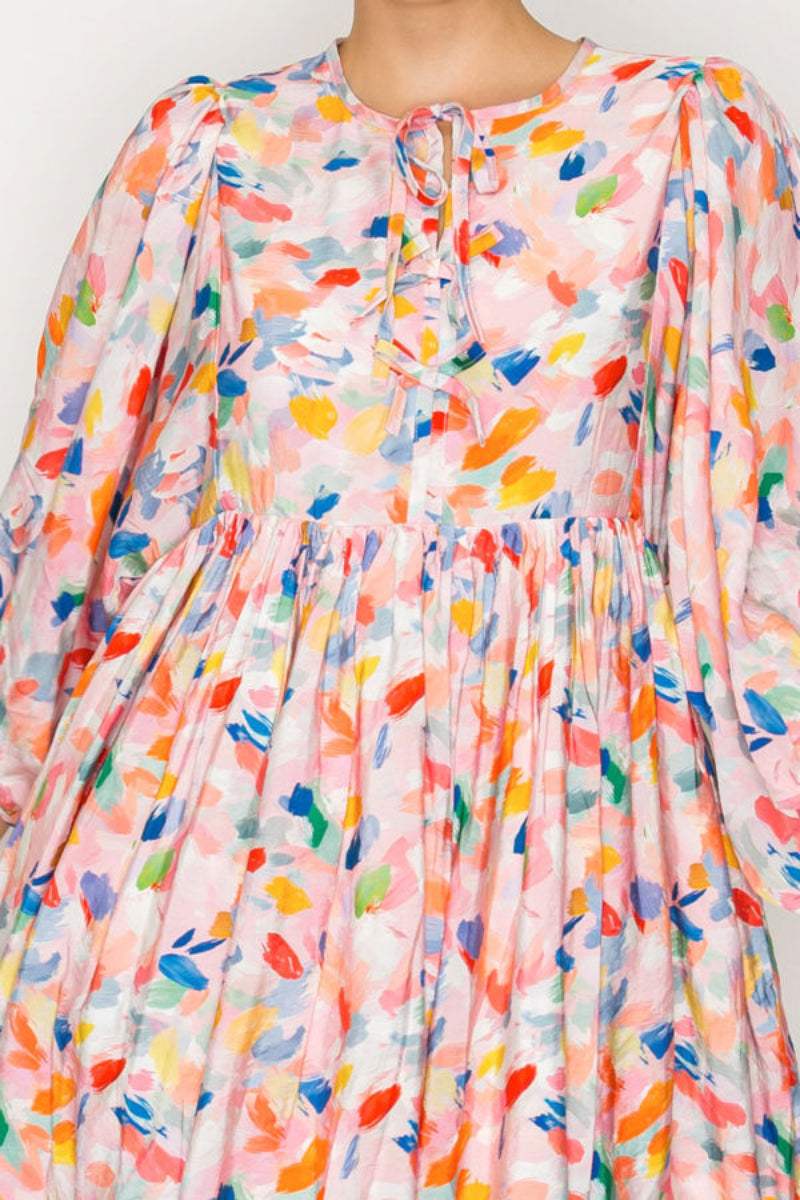 FLOWY MIDI DRESS FEATURES A SOFT BLUSH BASE-SHD1035