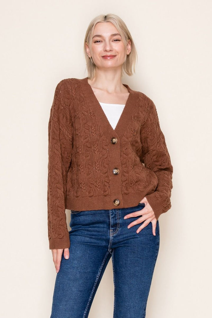 long sleeve polka dot ribbon print knit top with a mock neck