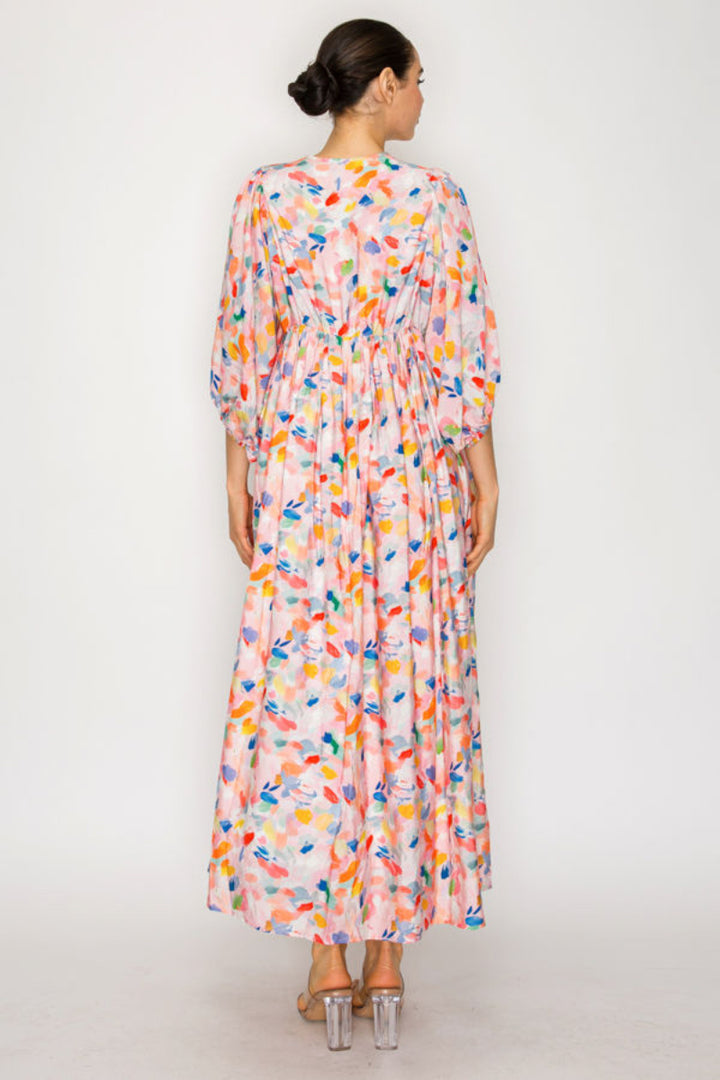 FLOWY MIDI DRESS FEATURES A SOFT BLUSH BASE-SHD1035