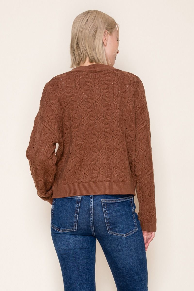 long sleeve polka dot ribbon print knit top with a mock neck