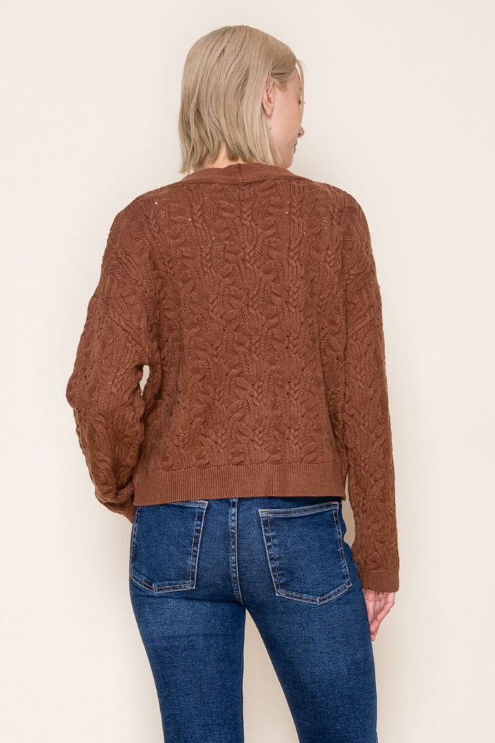 long sleeve polka dot ribbon print knit top with a mock neck