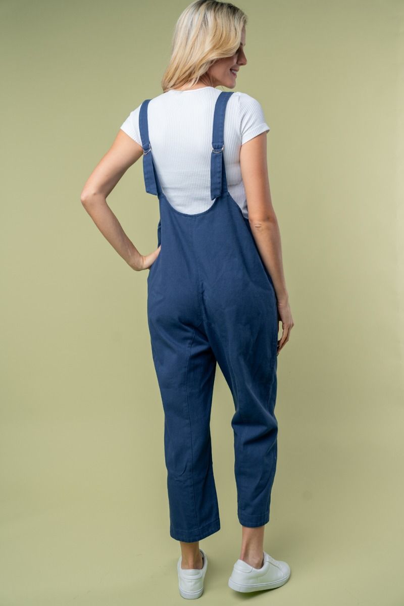 SLEEVELESS SOLID KNIT JUMPSUIT WITH SCOOP V-NECK