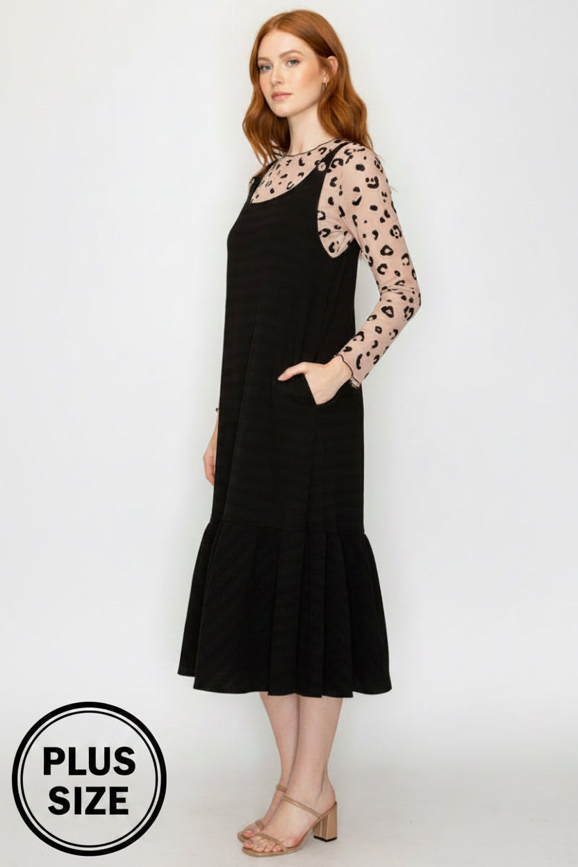 PLUS SIZE EFFORTLESS STYLE MEETS COMFORT IN THIS RELAXED JUMPER DRESS